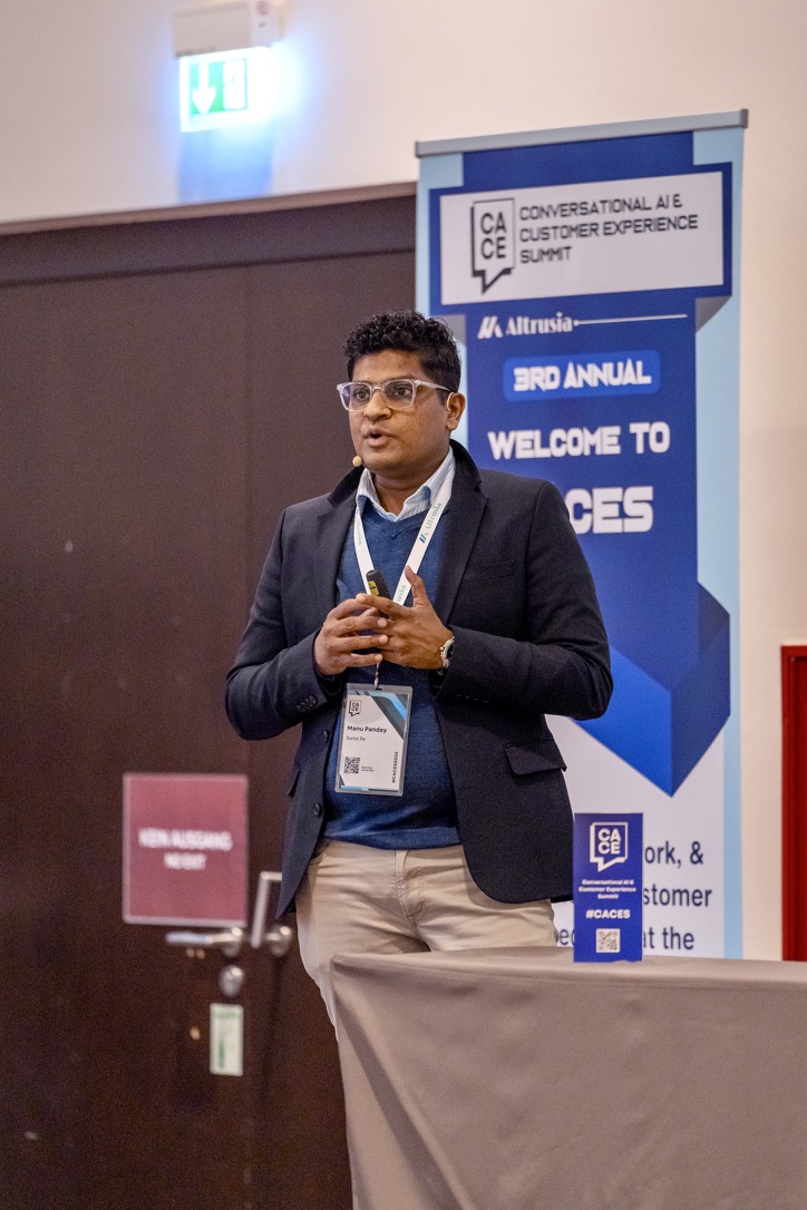 Manu speaking at the Conversational AI and Customer Experience Summit