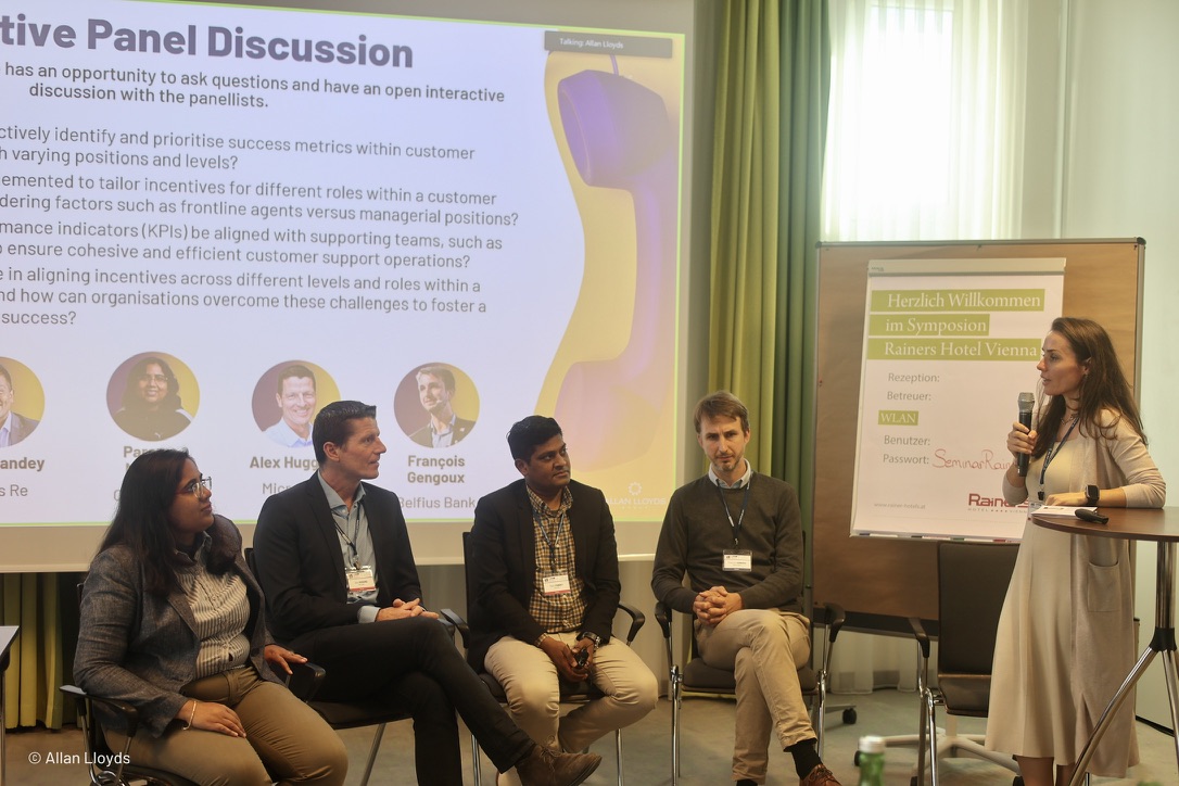 Manu participating in an interactive customer experience panel in Vienna